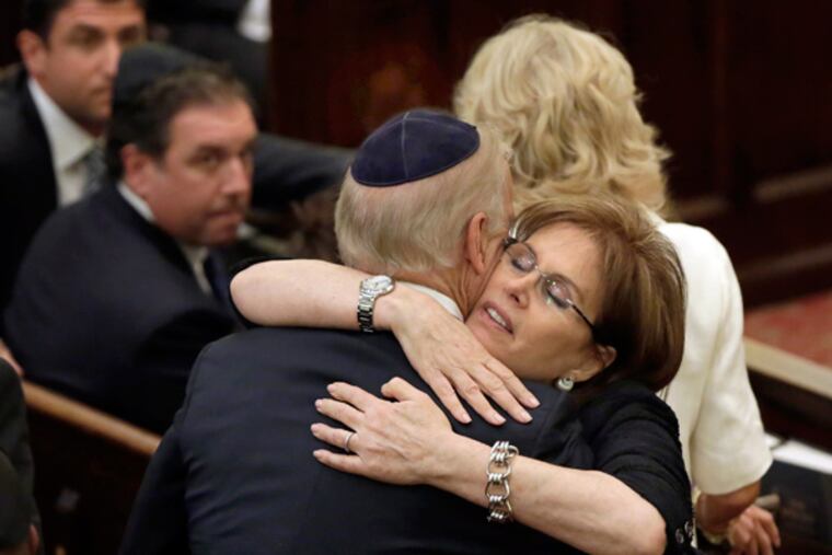 Bonnie Englebardt Lautenberg, widow of U.S. Sen. Frank Lautenberg, embraces Vice President Joe Biden, before her husband's funeral, in New York's Park Avenue Synagogue, Wednesday, June 5, 2013. Lautenberg, a liberal Democrat from New Jersey, died Monday after suffering complications from viral pneumonia. At 89, he was the oldest member of the Senate and the last of 115 World War II veterans to serve there. (AP Photo/Richard Drew, Pool)