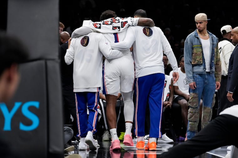 76ers center Andre Drummond (1) leaves court after getting injured during the first half of Friday's game.