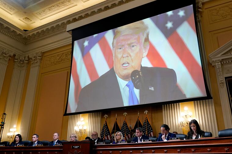 A video of former President Donald Trump is shown on a screen as the House select committee investigating the Jan. 6 attack on the U.S. Capitol holds its final meeting last week.