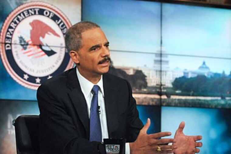 U.S. Attorney General Eric Holder speaking on "Meet the Press" in Washington Sunday, May 9, 2010. (AP Photo/NBC, William B. Plowman)