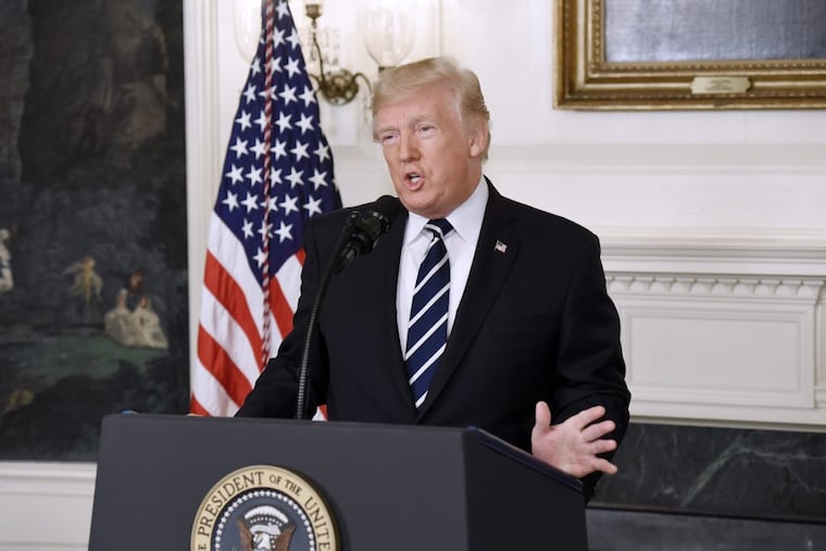 President Trump makes a statement on the mass shooting at an outdoor concert in Las Vegas in the diplomatic room of the White House.