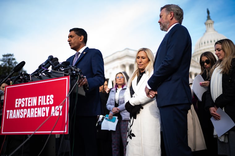 From left, Reps. Ro Khanna (D-California), Marjorie Taylor Greene (R-Georgia) and Thomas Massie (R-Kentucky) held a news conference outside the U.S. Capitol in November 2025 with victims of convicted sex offender Jeffrey Epstein. Victims have asked for a meeting with King Charles during his upcoming visit to Washington.