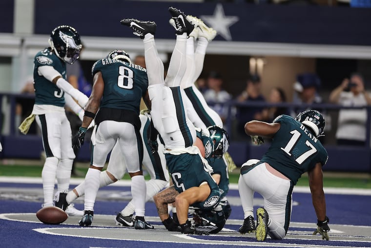 Eagles linebacker Zack Baun joins his teammates as he celebrates a fumble recovery in the fourth quarter against Dallas at AT&T Stadium on Sunday, Nov. 10, 2024, in Arlington. Eagles win 34-6 over the Cowboys.