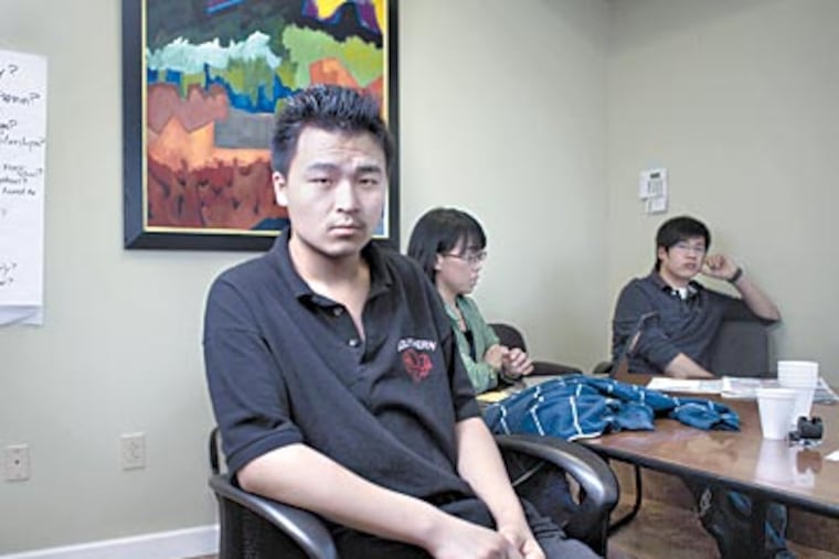 LinDi Liu, 16, in ninth grade at South Philadelphia High School, speaks at the The Philadelphia Chinatown Development Corporations office. He recounted being attacked on March 16th in a rest room at the school. (Ed Hille / Staff Photographer)