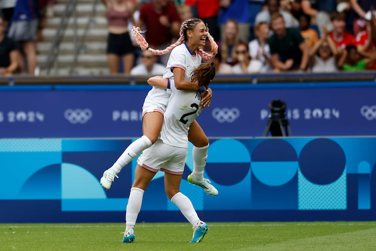 Trinity Rodman (top) celebrates her goal for the U.S. women's soccer team vs. Japan in the Olympics quarterfinals.