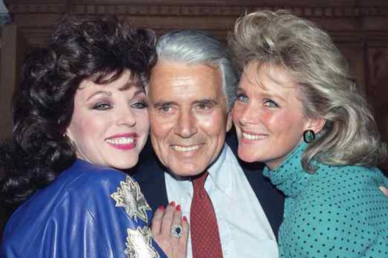 Actor John Forsythe with "Dynasty" costars Joan Collins (left) and Linda Evans in 1986. The ABC show ran from 1981-89.