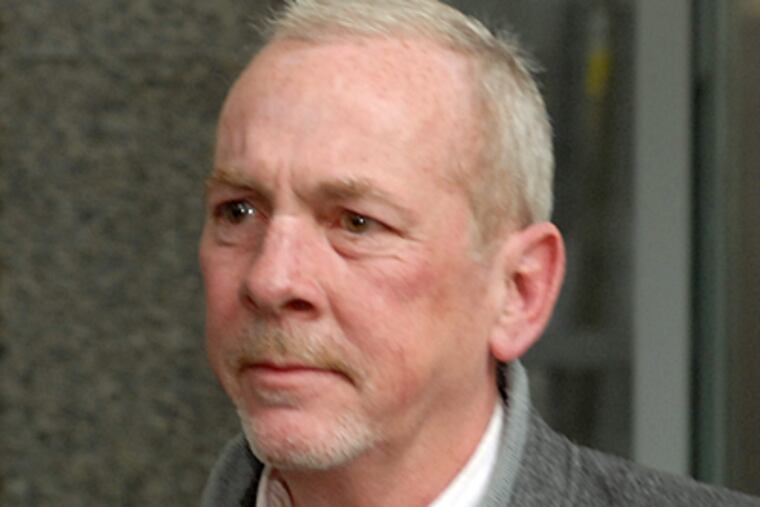 The Rev. James J. Brennan, one of 2 on trial.