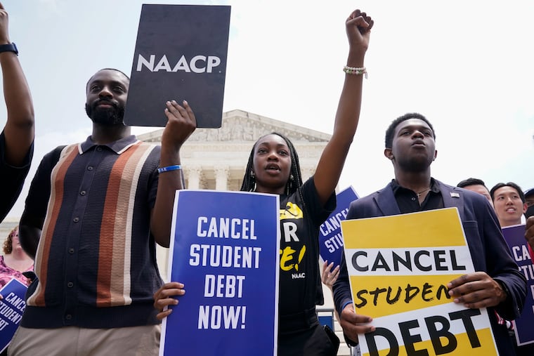 Jordan Braithwaite, 21, center, an undergrad at Grambling State University with more than $10,000 in student loans, demonstrates outside the Supreme Court June 30 after the justices ruled that the Biden administration overstepped its authority in trying to cancel or reduce student loan debts for millions of Americans.