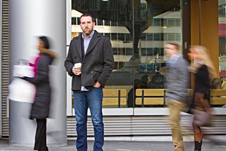 Detective Joseph Murray photographed at 15th and S. Penn Square where he saw a pickpocket inside the La Colombe coffee shop, Philadelphia, December 19, 2013. ( DAVID M WARREN / Staff Photographer )