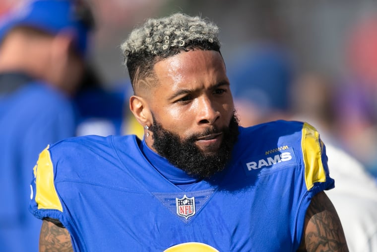 Los Angeles Rams wide receiver Odell Beckham Jr. walks on the sideline during a NFL divisional playoff football game.