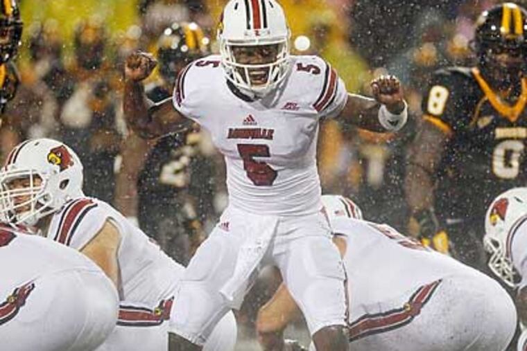 Quarterback Teddy Bridgewater and Louisville are ranked No. 18. (Rogelio V. Solis/AP)