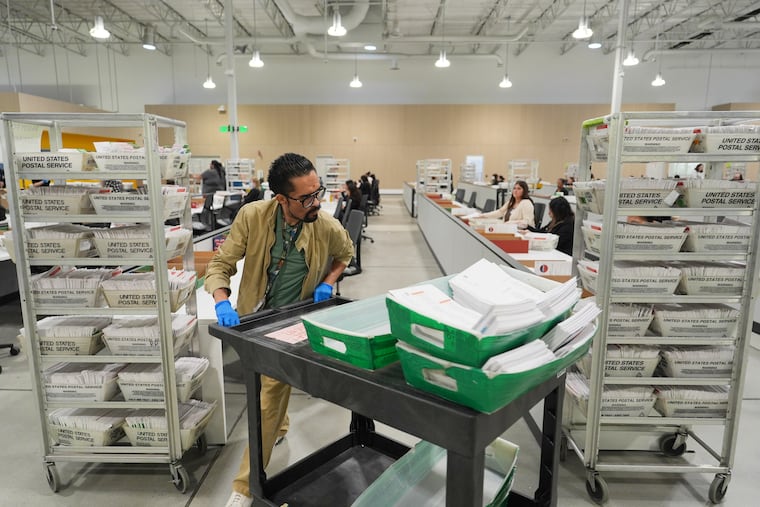 FILE - Ballots are sorted the day after California's primary election at the LA County Ballot Processing Center, June 3, 2026, in City of Industry, Calif.