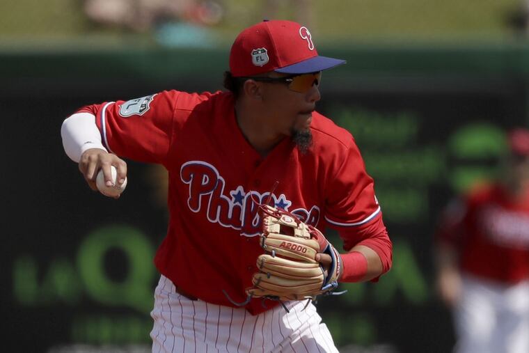 J.P. Crawford throws to first base during a spring training game in March.