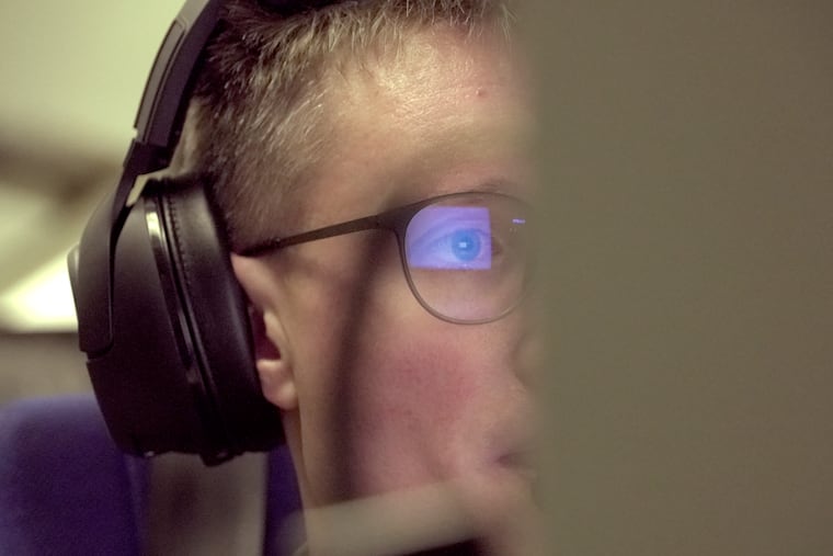 A crew member analyzes data on a monitor aboard a French military AWACS surveillance plane as it flies a 10-hour mission to eastern Romania for the NATO military alliance on Tuesday, Jan. 9, 2024.