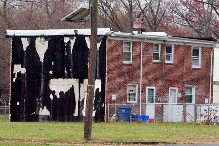 Some Mount Holly Gardens residents refused to leave to make way for redevelopment. The settlement of their case, just before the U.S. Supreme Court was to take it up, will give some of them new homes in the neighborhood