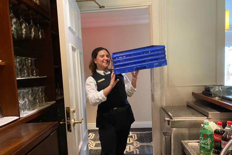 Valentina Spadea serves and bartends in a members-only country club on the Main Line.