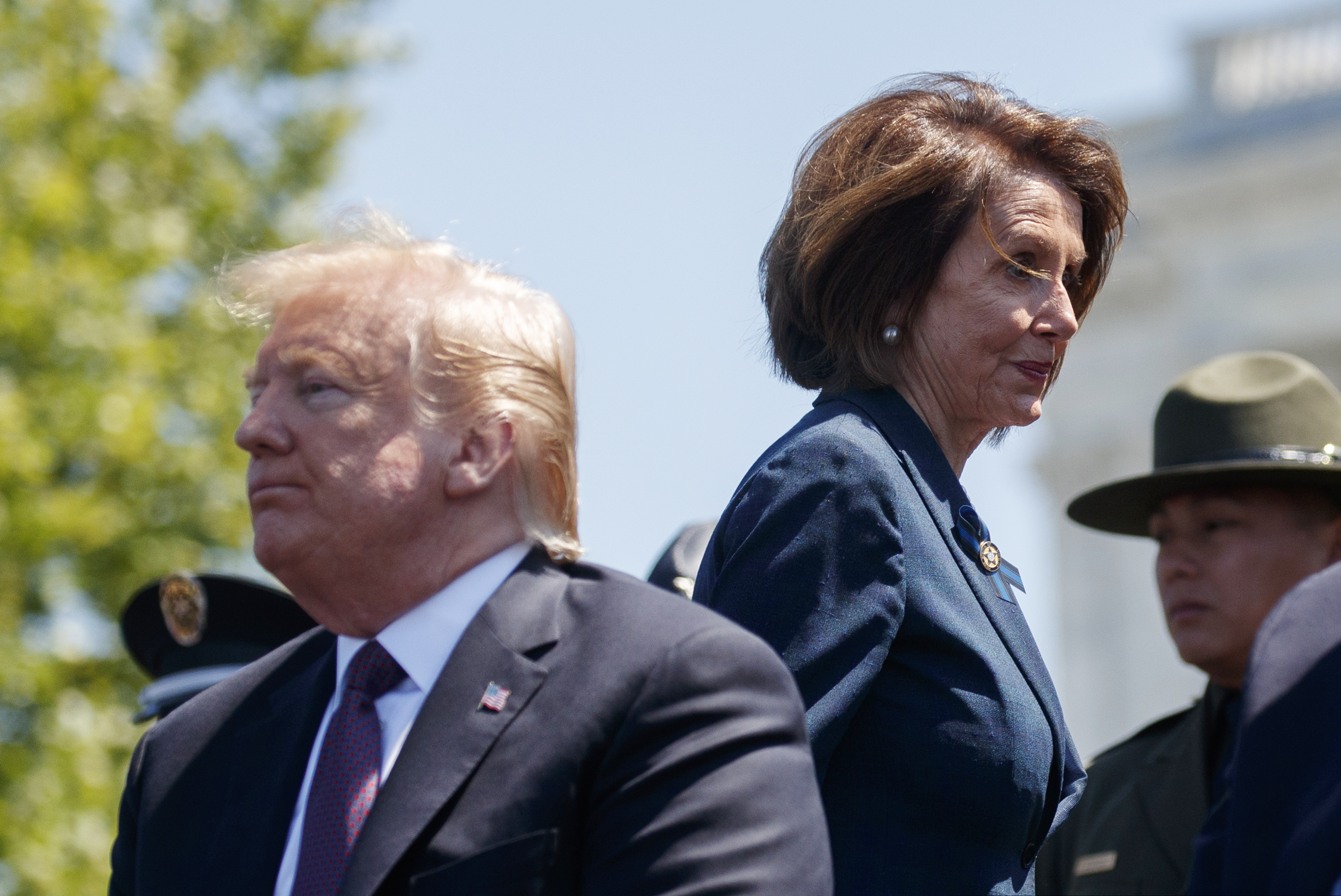 President Donald Trump and Speaker of the House Nancy Pelosi of Calif., attend the 38th Annual National Peace Officers' Memorial Service at the U.S. Capitol, Wednesday, May 15, 2019, in Washington. Pelosi said Wednesday that the U.S. must avoid war with Iran and she warned the White House has “no business” moving toward a Middle East confrontation without approval from Congress. (AP Photo/Evan Vucci)