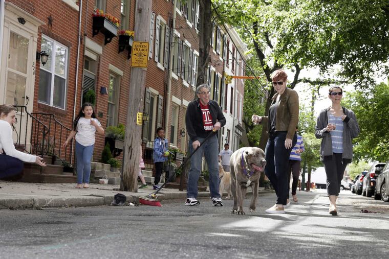 On Montrose Street: (from left) Allison Nicklin; Lucy Metzler, 9; David Richard, 7; Clark DeLeon; Gigi the dog and owner Ash Macri; and Jackie Newall.