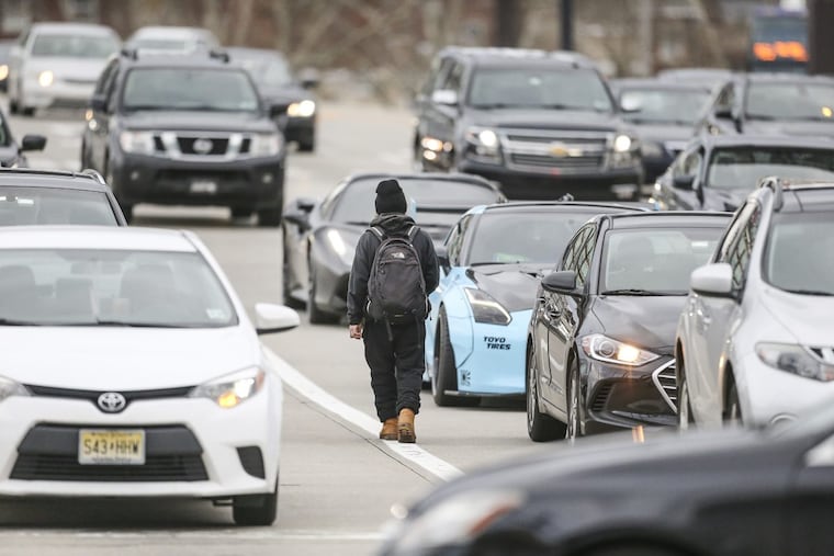 Panhandlers asking for money on the road from the Ben Franklin Bridge to I-676 are a familiar sight in Philadelphia.