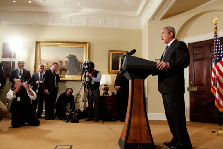 The president announcing the automaker bailout plan Friday. He pledged $17.4 billion to keep General Motors and Chrysler afloat.
