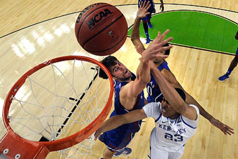 An NCAA Tournament full of controversial calls ended with a championship game that was well-officiated. (Chris Steppig/AP)