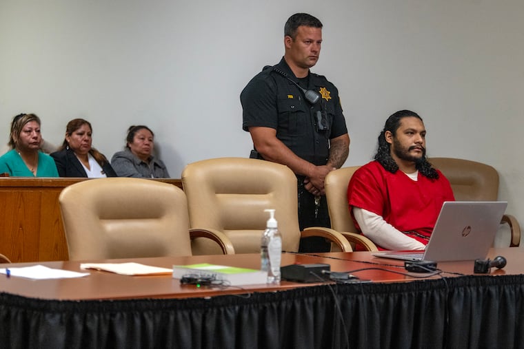 Cristian Custodio-Aquino is in court in Camden during his detention hearing Tuesday, Jun. 3, 2025. Aquino is accused of murdering veterinarian Michael Anthony, stabbing him on the front lawn of his Cherry Hill home in December, 2024. (NOTE: Aquino family members are seated in courtroom at left.)