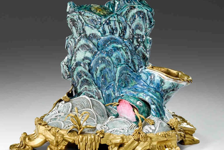 A Chinese glazed porcelain centerpiece, in the shape of a rock formation rising out of waves from which a three-legged toad emerges, is expected to fetch $150,000 to $250,000 at Freeman's.