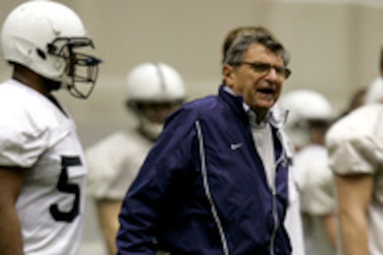 Penn State coach Joe Paterno walks the sideline during spring practice. "I'm not doing as much as I like to do," Paterno said.