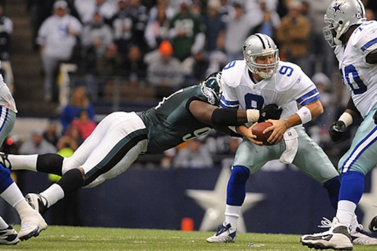 Eagles defensive tackle Brodrick Bunkley sacks Cowboys quarterback Tony Romo during the fourth quarter of the December game in Dallas. During the game, TV cameras kept focusing on Jessica Simpson. After Dallas lost, Terrell Owens said Simpson was no good luck charm.