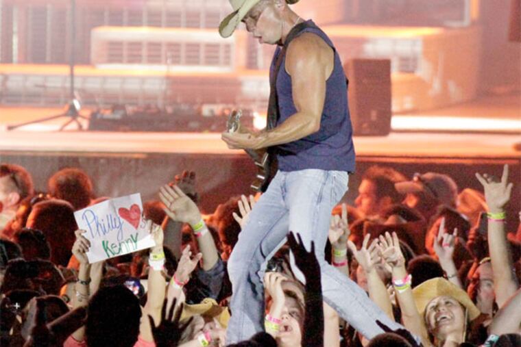 Kenny Chesney performs at Lincoln Financial Field during his No Shoes Nation 2013 tour on June 8, 2013. ( ELIZABETH ROBERTSON / Staff Photographer )