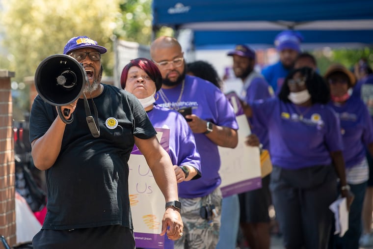 Union workers protest on Friday August 6, 2021., at the PowerBack facility at 1526 Lombard St. in Philadelphia, Pa. they are holding a one-day strike to protest a spike in health-insurance costs under new operator, ProMedica, which took over in April from Genesis Healthcare.
