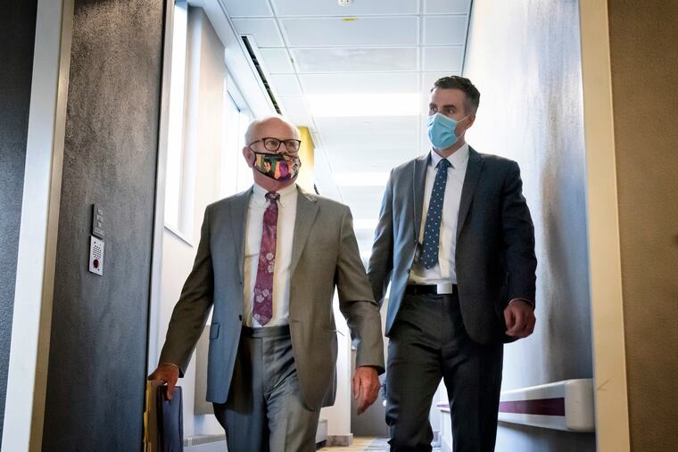 Former Minneapolis police officer Thomas Lane, right, walking out of the Hennepin County Public Safety Facility on June 20 in Minneapolis with his attorney, Earl Gray, after a hearing.