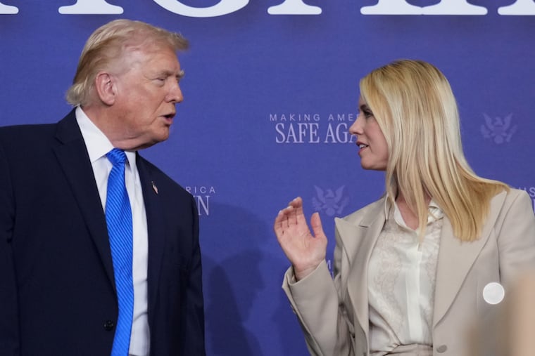 President Donald Trump speaks with then-Attorney General Pam Bondi during a roundtable discussion on public safety at a Tennessee Air National Guard Base, Monday, March 23, 2026, in Memphis, Tenn. (AP Photo/Mark Schiefelbein)