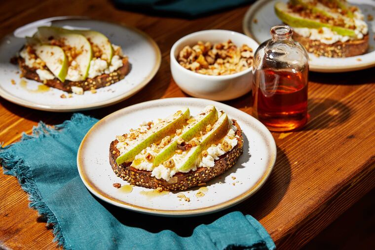 Ricotta toasts with pear, walnuts, maple and cinnamon.
