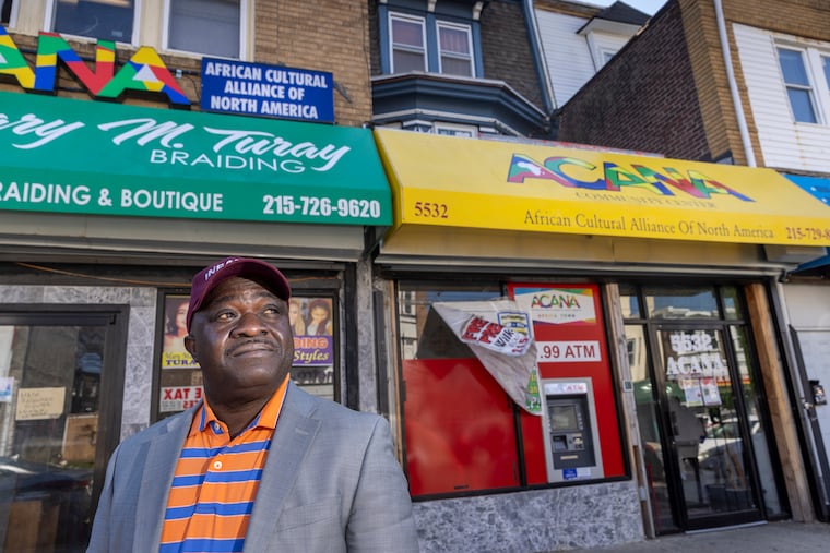 Southwest Philly small business owners have organized to improve the community, which includes many West African immigrant merchants. Photograph of Musa Trawally, director of Community and Business Development for ACANA, the African Cultural Association of North America, at 5530 Chester Avenue in Philadelphia, on Tuesday, March 29, 2022.