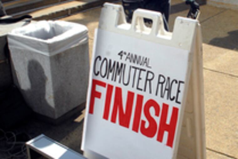 Jill Minick walks toward the finish line, coming in last on SEPTA. But she got some reading done.
