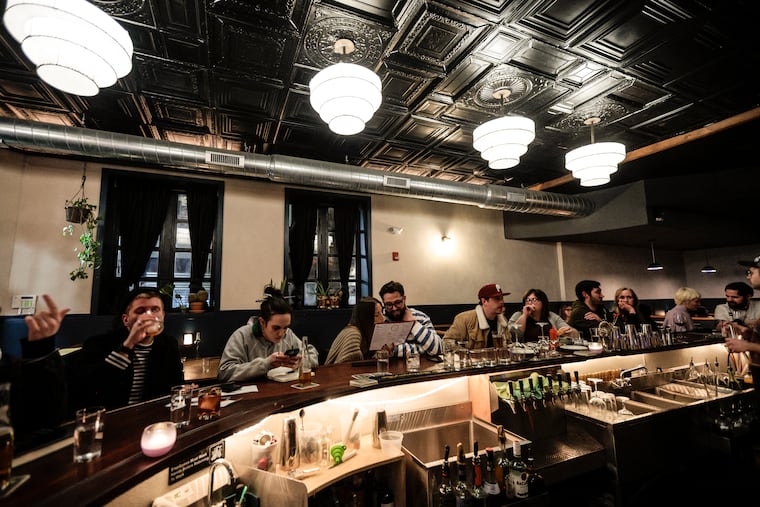 Lunar Inn on a Friday night people enjoying their time at the bar in February 2023. The Port Richmond bar will close Dec. 31, 2023.