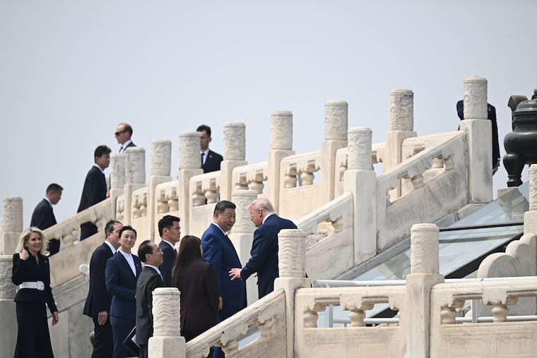 President Donald Trump and President Xi Jinping of China visit the Temple of Heaven in Beijing during their two-day summit, on Thursday, May 14, 2026. In contrast to his rhetoric about China at home, President Trump spoke in conciliatory terms with Xi Jinping, the Chinese leader.