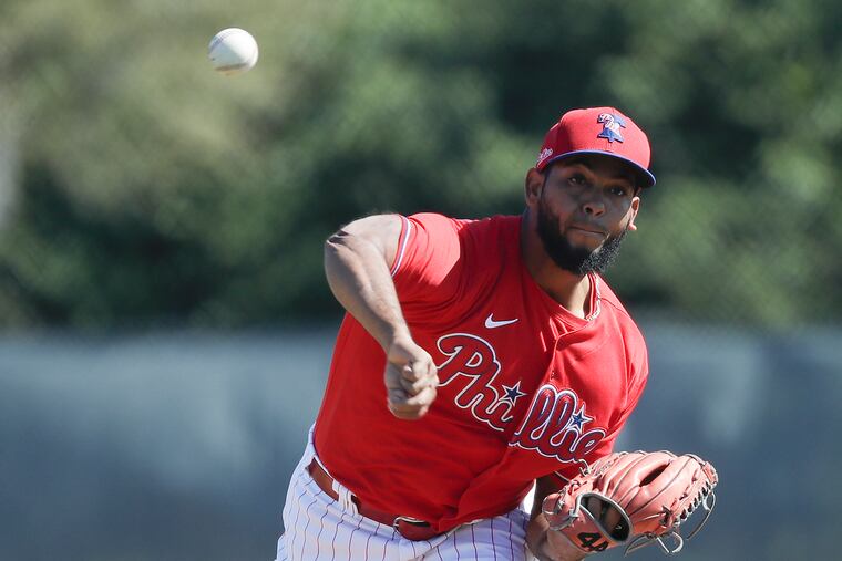 Phillies pitcher Seranthony Dominguez pitches during a simulated game at the Carpenter Complex on Sunday.