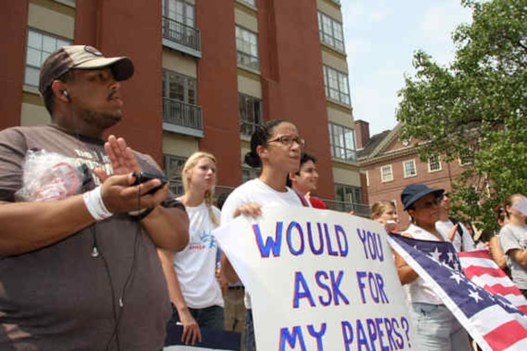 Opponents of Arizona's immigration law rally in Old City, though a judge put parts of the law on hold. "Immigration for some . . . has become the new segregation," Mayor Nutter said.