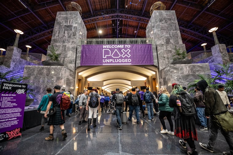 Guests at Pax Unplugged held at the Pennsylvania Convention Center on Friday, Nov. 21, 2025. The gaming convention that is held in Philadelphia every year, has become a major event for fans of Dungeons & Dragons, Warhammer, Magic: The Gathering, and other tabletop role-playing games.