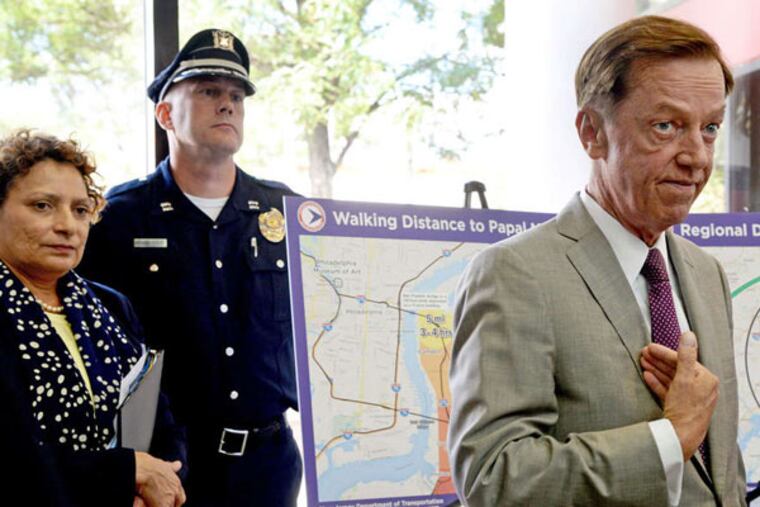 New Jersey Transportation Commissioner Jamie Fox (right) joins other officials at a press conference in Camden on Aug. 13, 2015. (TOM GRALISH/Staff Photographer)