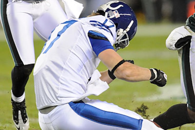 Indianapolis' Austin Collie suffered a concussion after a helmet-to-helmet hit yesterday. (Clem Murray/Staff Photographer)