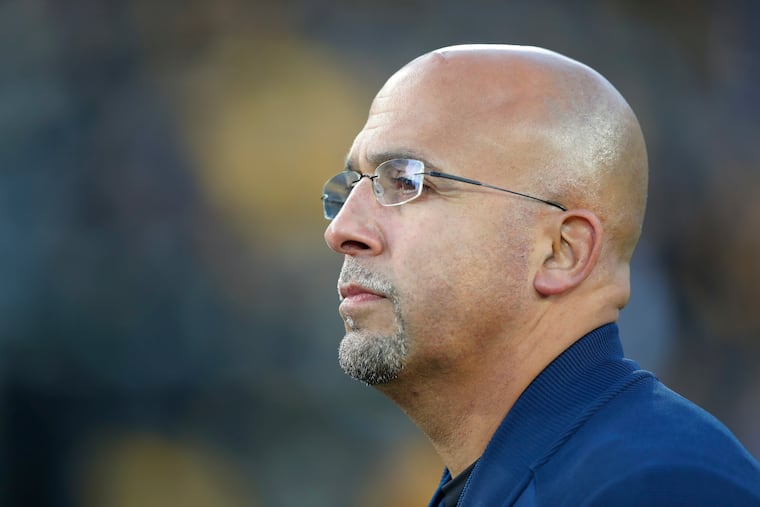 Penn State head coach James Franklin watches warmups before an NCAA college football game against Iowa, Saturday, Oct. 12, 2019, in Iowa City, Iowa. (AP Photo/Matthew Putney)