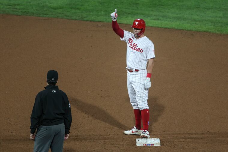 Rhys Hoskins celebrates his two-run double again the Nationals during the seventh inning at Citizens Bank Park.