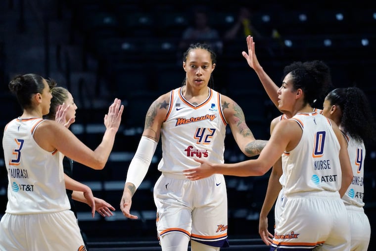 The Phoenix Mercury's Brittney Griner is congratulated during a WNBA playoff game against the Seattle Storm