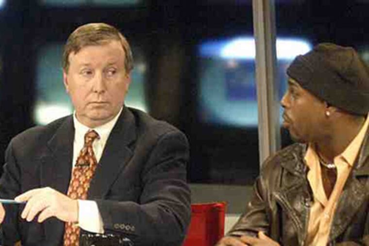 Ray Didinger, seen here with Vaugn Hebron, will appear on CSN's Eagles coverage this season. (H. Rumph Jr./AP file photo)