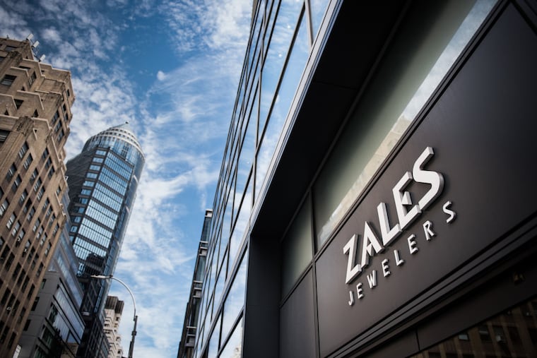Signage for Zales Jewelers, a subsidiary of Signet Jewelers Ltd., is displayed on the exterior of a store in New York in August 2017. Signet Jewelers, the owner of Kay Jewelers and Zales, told suppliers it would no longer buy stones mined in Russia, the world’s biggest source of gems. CREDIT: Bloomberg photo by Mark Kauzlarich