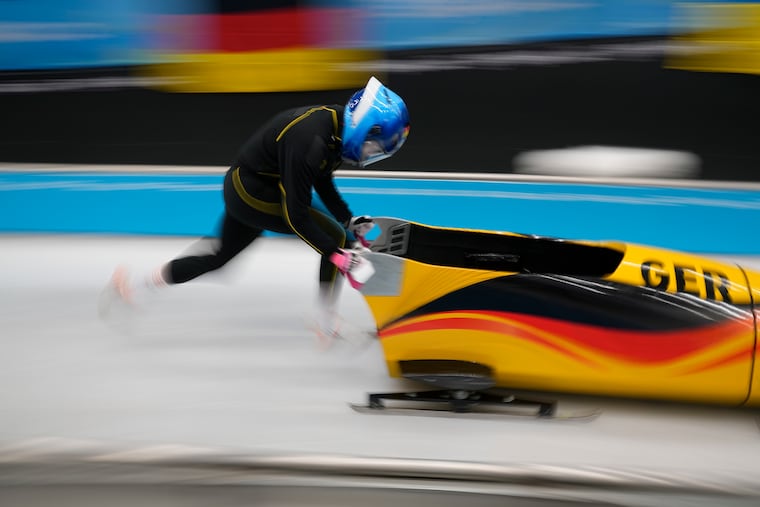 Laura Nolte of Germany starts during a women's monobob training heat at the 2022 Winter Olympics.