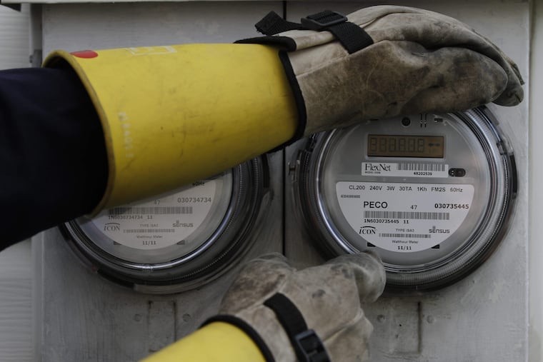 A Peco electric meter in Bristol, Bucks County. Residential customers receiving the company’s default service will see a 6% drop in the rate per kilowatt hour (kWh).